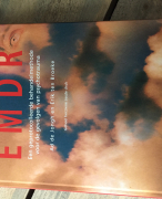 Handboek EMDR 'een geprotocolleerde behandelmethode voor de gevolgen van psychotrauma' 